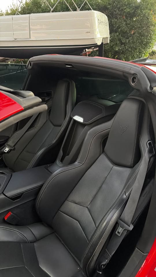 Black GT seats inside the red Corvette Stingray